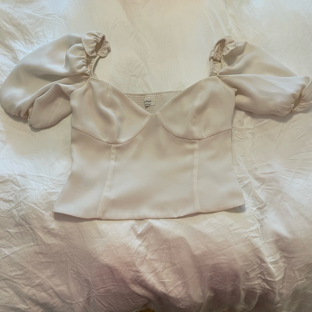 Corset style blouse with puff sleeves